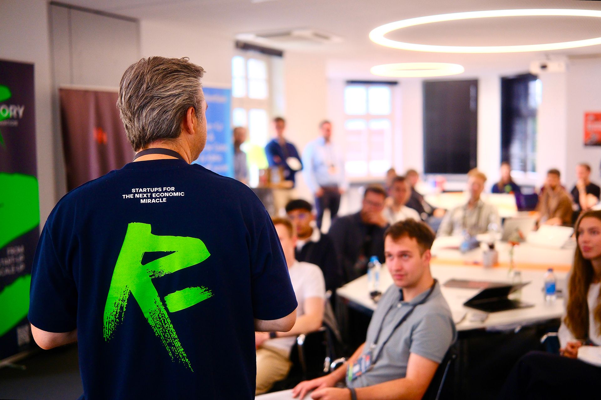 A speaker from R-Factory leads a workshop session for the participants